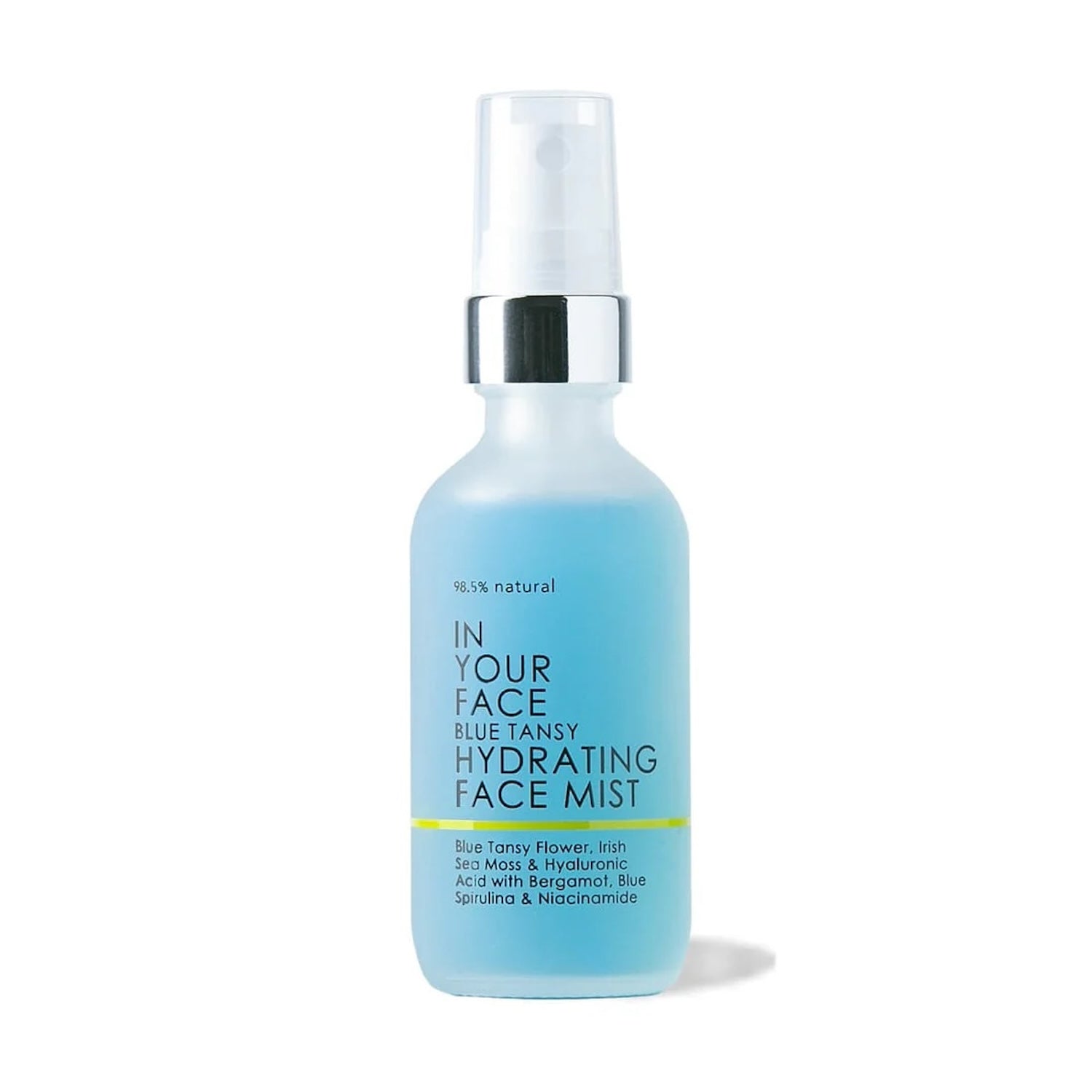 Glass bottle of In Your Face Blue Tansy Hydrating Face Mist, a 98.5% natural formula featuring Blue Tansy Flower, Irish Sea Moss, Hyaluronic Acid, Bergamot, Blue Spirulina, and Niacinamide for refreshing hydration.