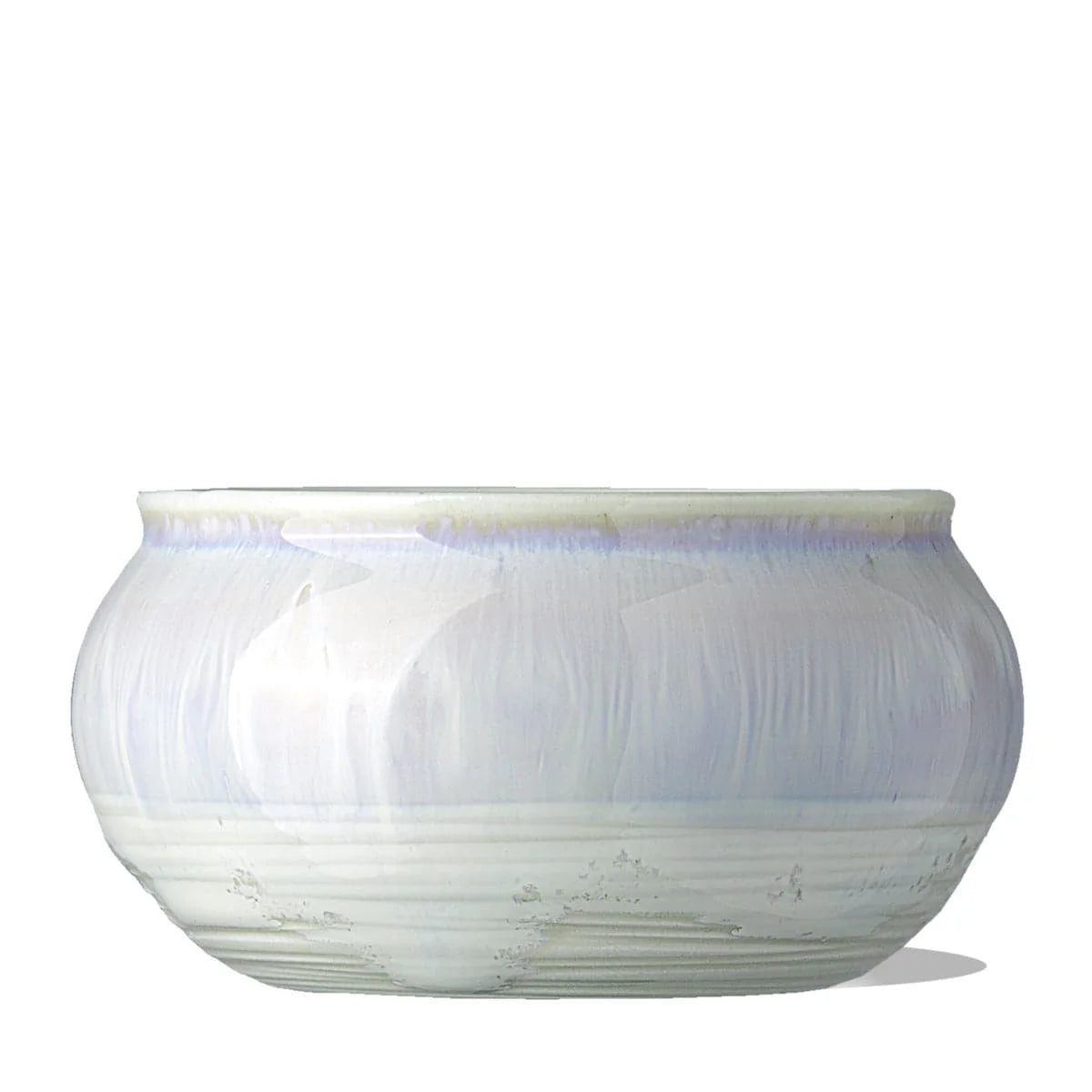 White ceramic bowl with a textured surface on a white background