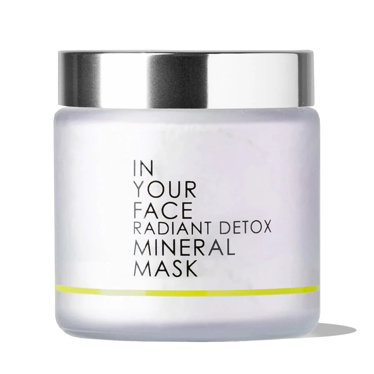 Jar of 'In Your Face Radiant Detox Mineral Mask' with a silver lid on a white background