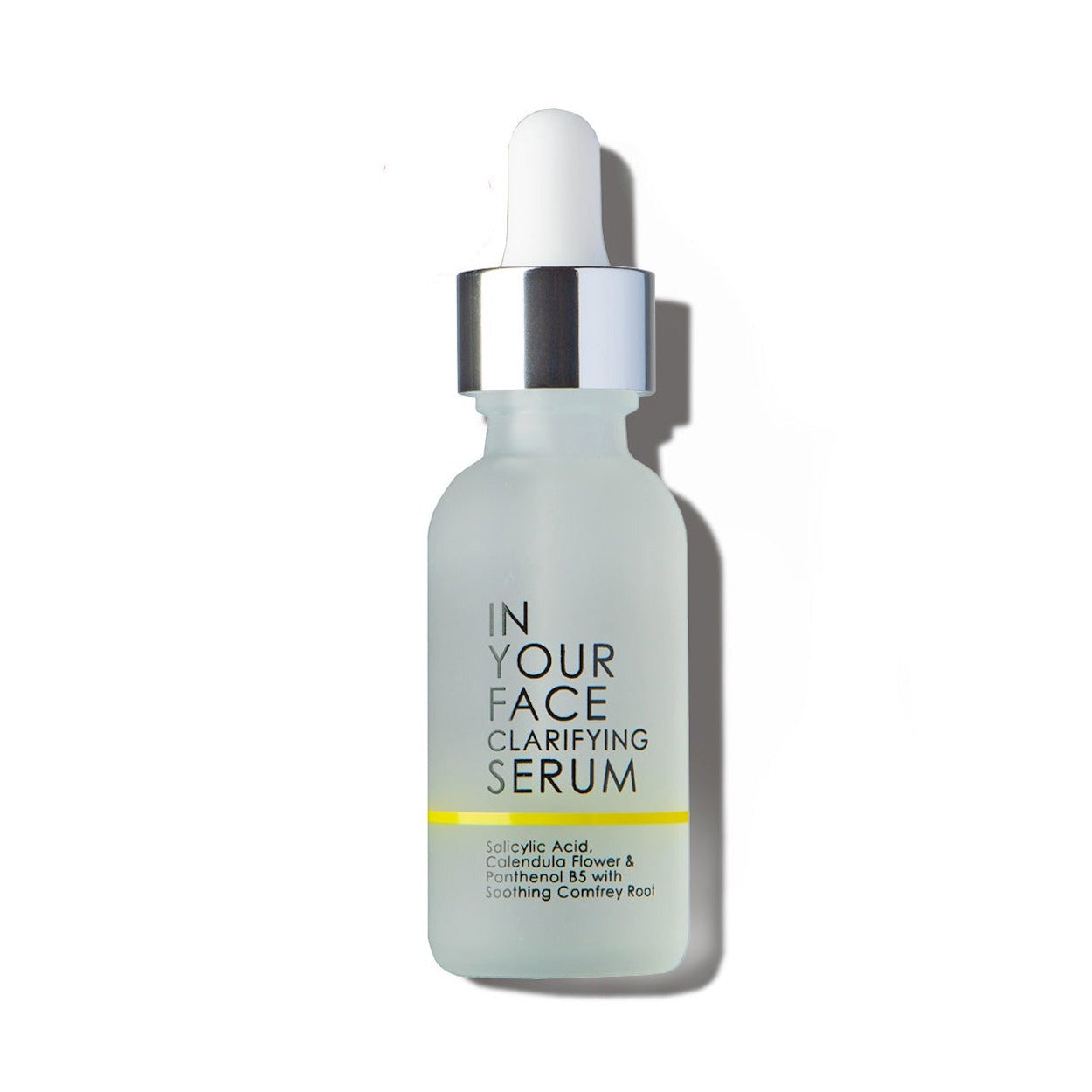 In Your Face Clarifying Serum in a frosted glass bottle, designed with salicylic acid and comfrey root to target blemishes.