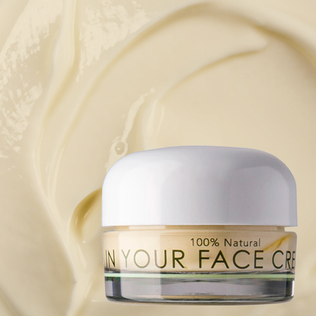 In Your Face Cream in a small glass jar with a white lid, formulated to provide intense hydration and nourishment for the skin.