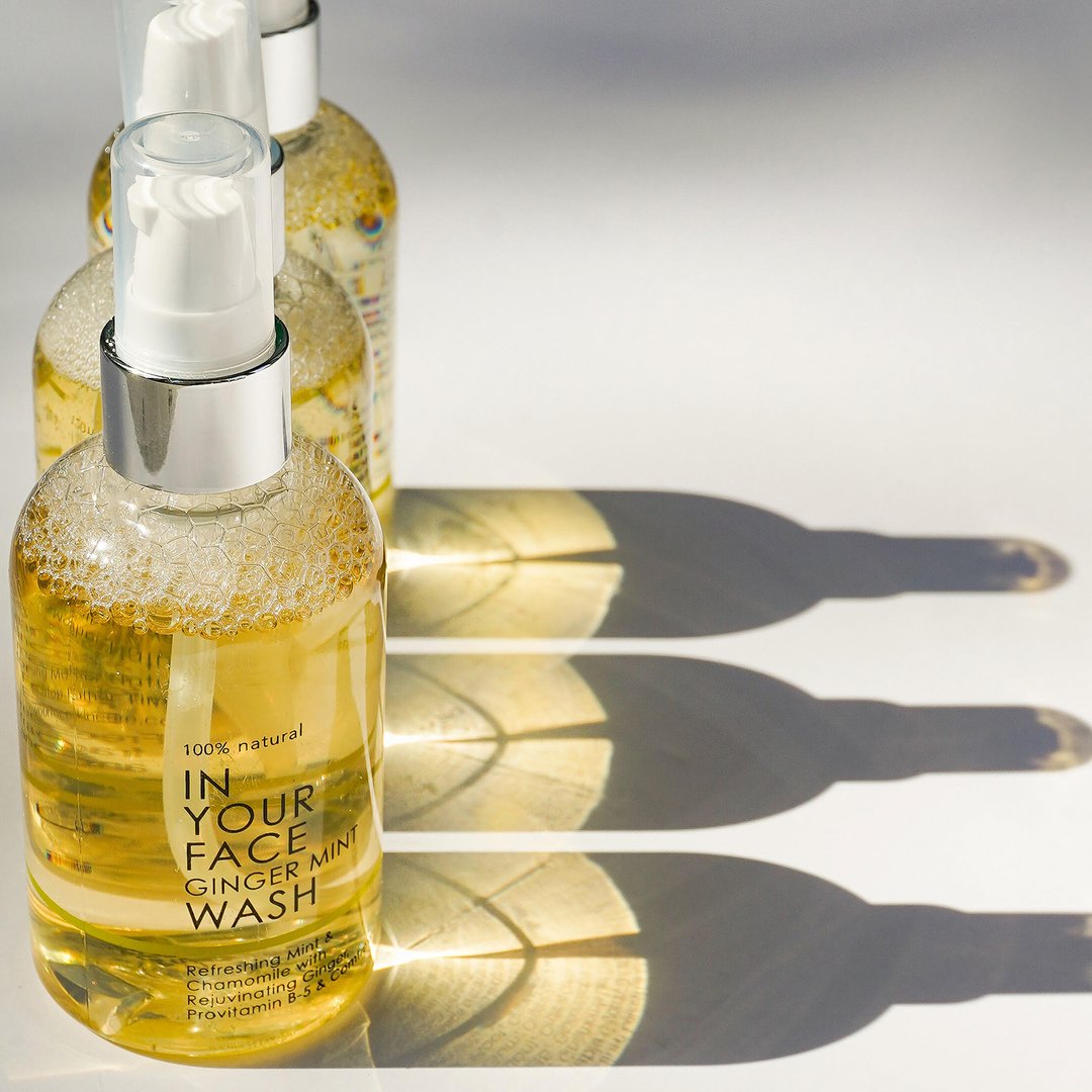 In Your Face Ginger Mint Wash in a clear bottle with a pump, designed for refreshing and cleansing the skin with natural mint and ginger.