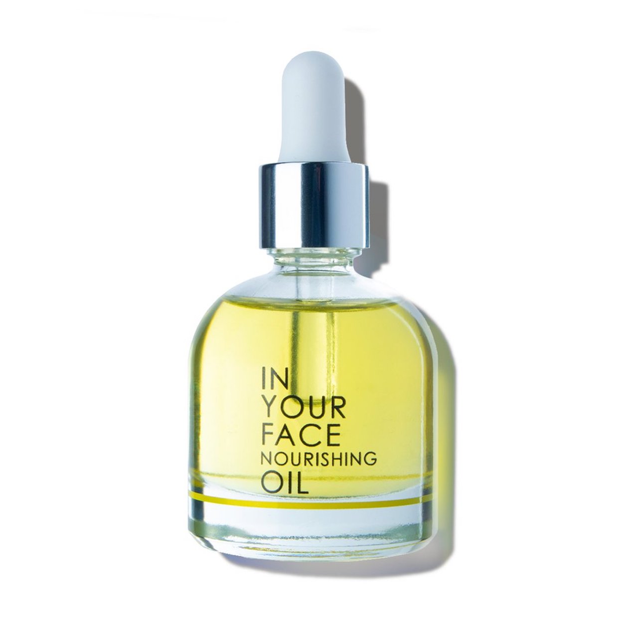 In Your Face Nourishing Oil in a glass bottle with a dropper, crafted to deeply nourish and hydrate the skin with natural oils.