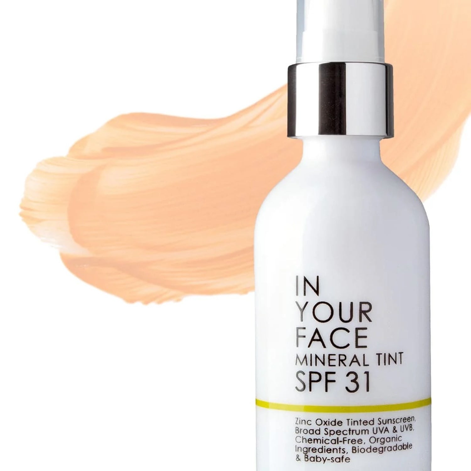 In Your Face Mineral Tint SPF 31 bottle with a peach-tinted swatch in the background, showcasing its universal shade and smooth application.