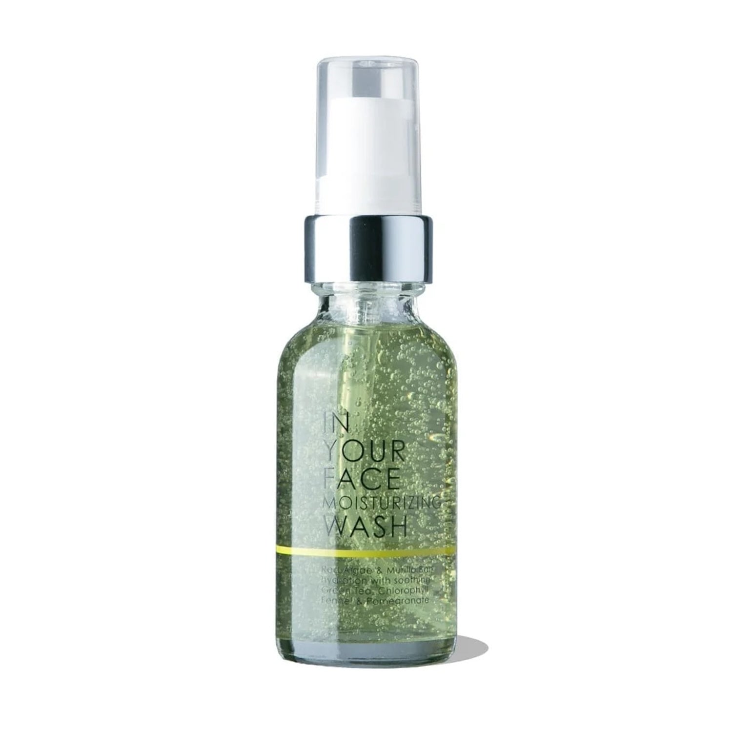 Glass bottle of In Your Face Moisturizing Wash Mini, a lightweight pH-balanced gel cleanser with antioxidants and hydrating properties for refreshed and clean skin.