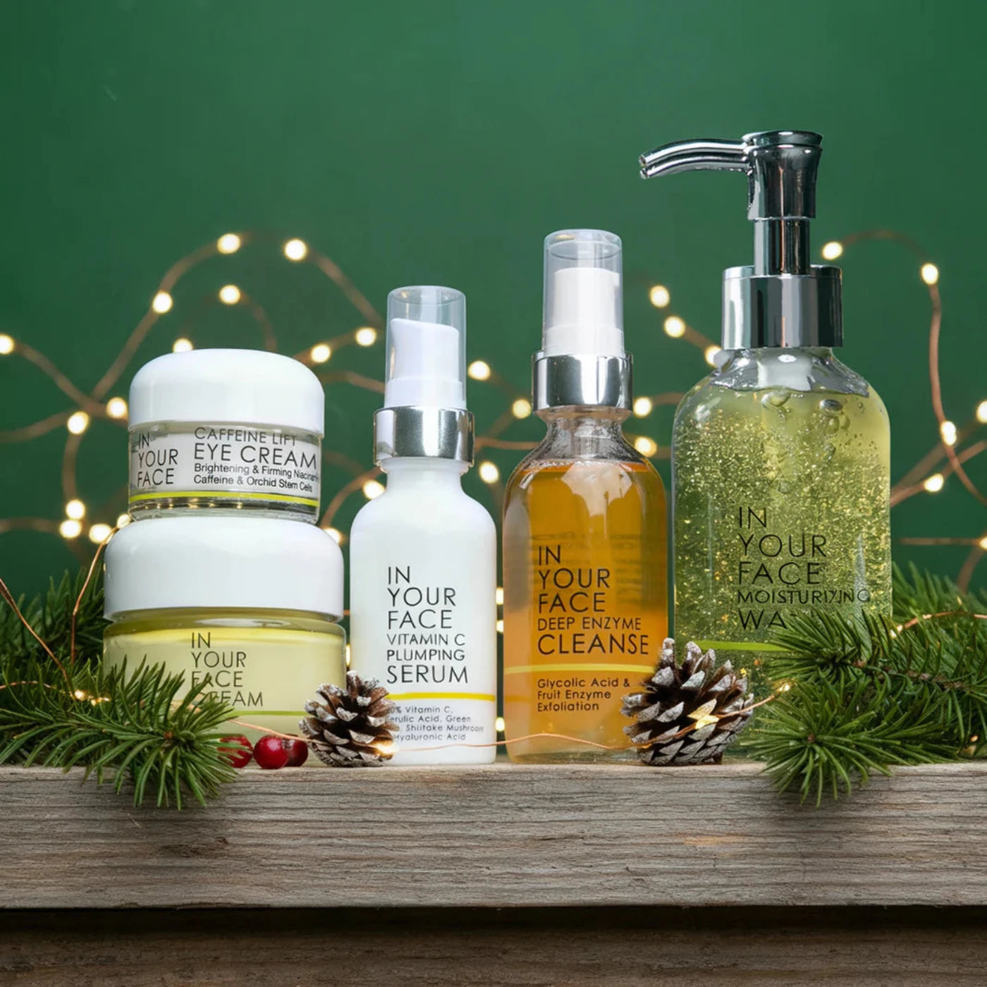 Set of skincare products on a wooden surface with a festive background