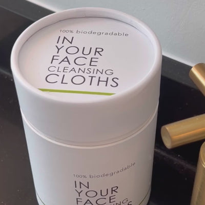 Video showcasing In Your Face Cleansing Cloths in action, emphasizing their 100% biodegradable nature, convenient compressed design, and effectiveness for gentle, sustainable skincare.