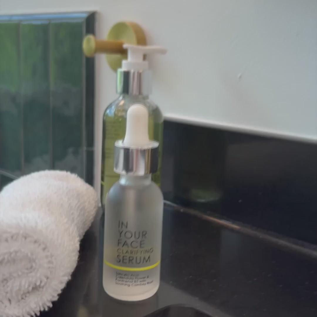 Demonstration of In Your Face Clarifying Serum – applied to skin to reduce acne, unclog pores, and improve skin clarity
