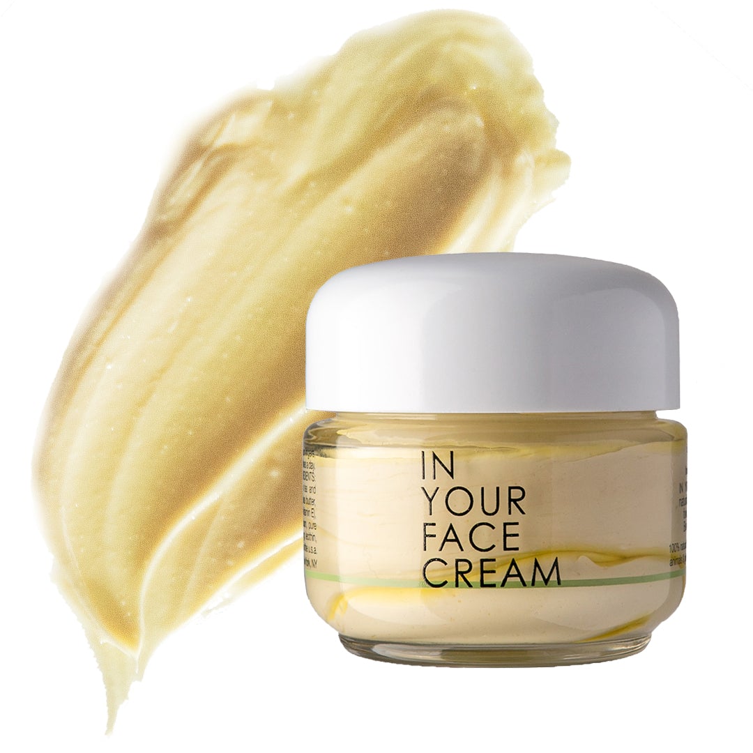 In Your Face Cream in a glass jar, a luxurious moisturizer that hydrates and nourishes the skin with natural extracts.