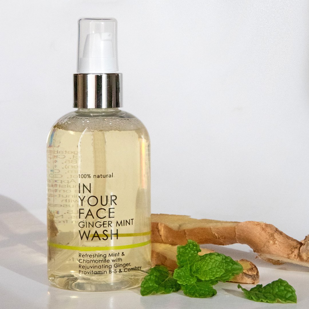 In Your Face Ginger Mint Wash in a clear bottle with a pump, designed for refreshing and cleansing the skin with natural mint and ginger.