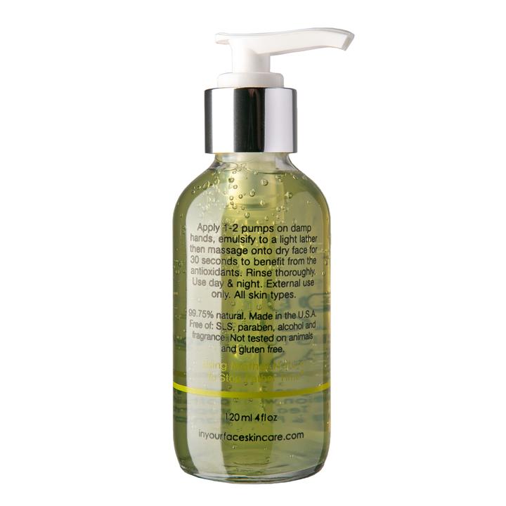 In Your Face Moisturizing Wash in a clear bottle with a pump, offering hydration with natural ingredients for a soft and clean skin feel.
