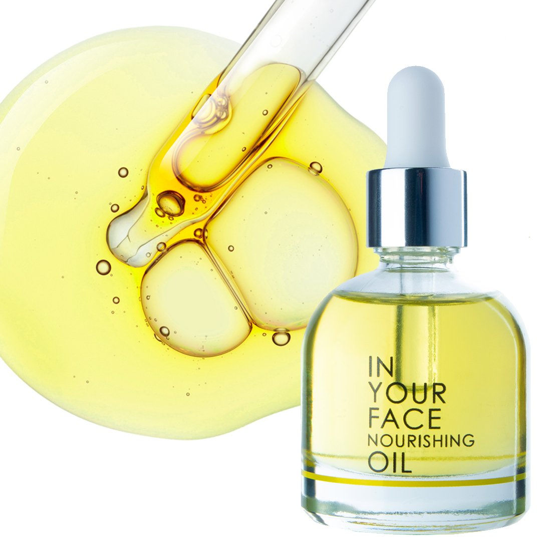 In Your Face Nourishing Oil in a glass bottle with a dropper, crafted to deeply nourish and hydrate the skin with natural oils.